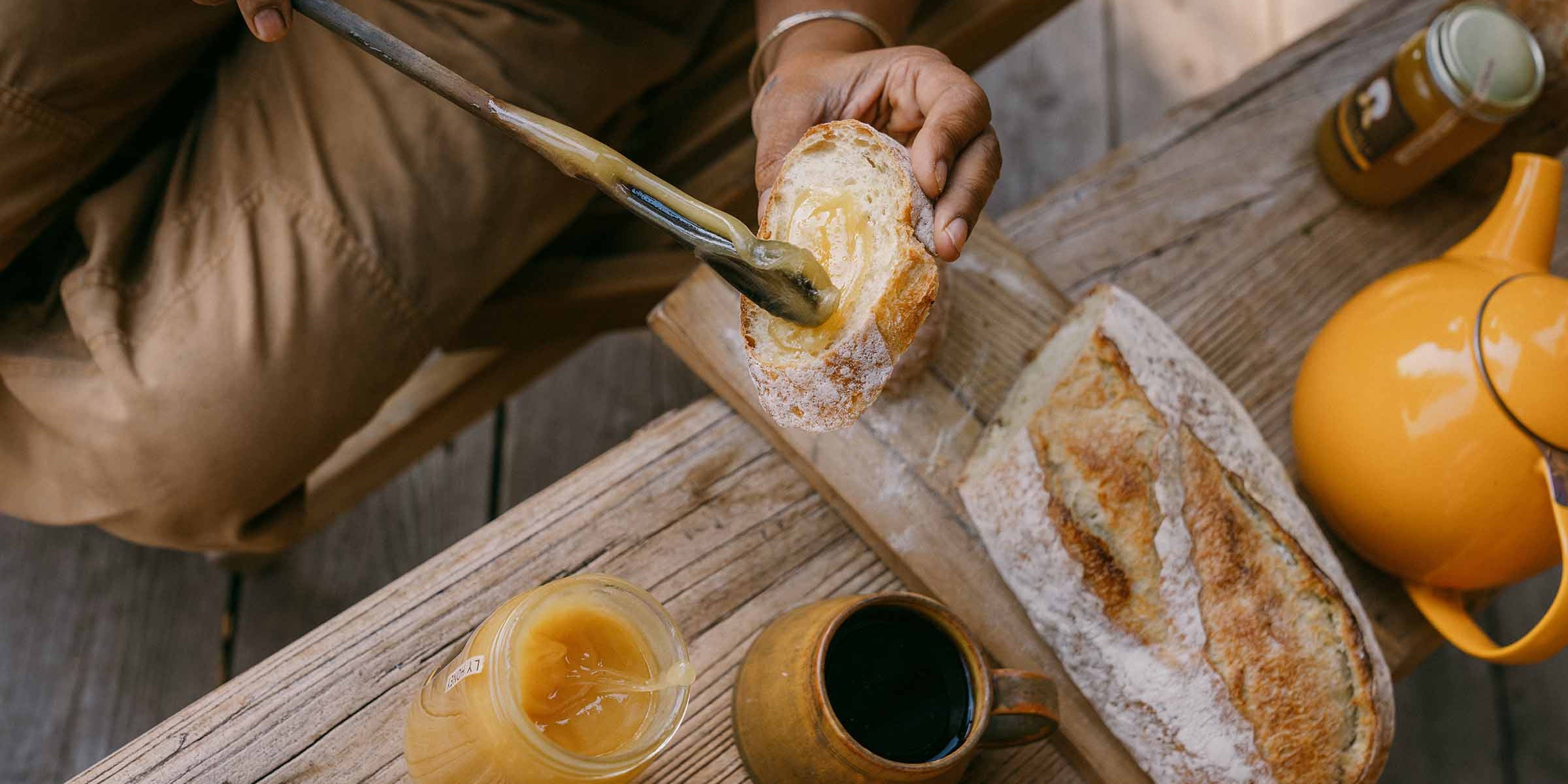 spreading-honey-on-bread.jpg